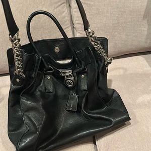 Mk large leather tote bag with strap.